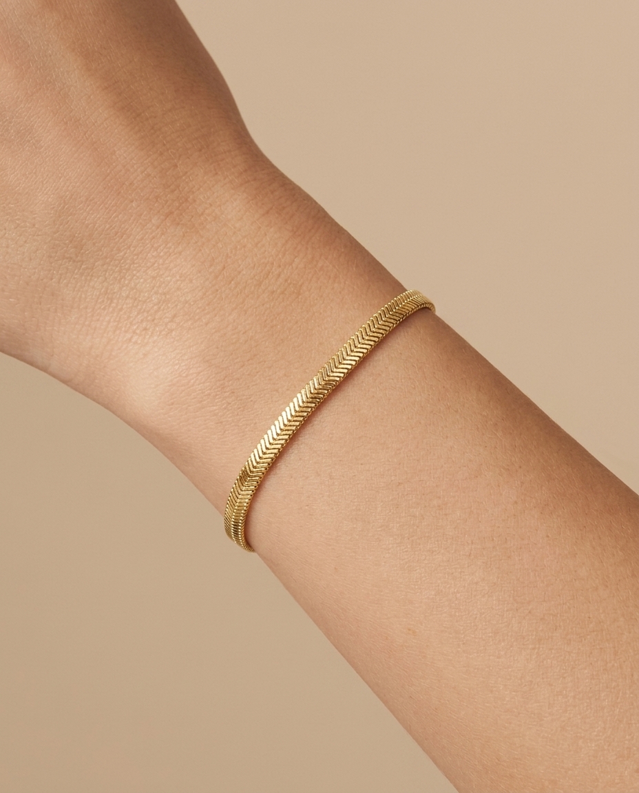 14KT Gold 5 MM Flate Snake Bracelet on model