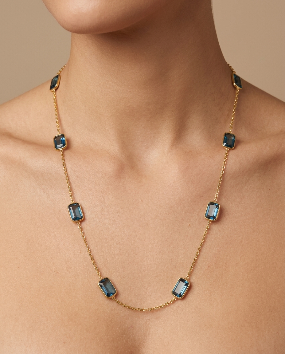 18KT Yellow Gold Bezeled Topaz Station Necklace on model
