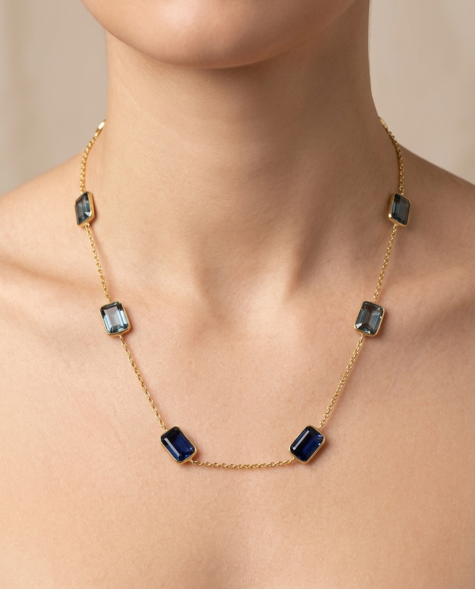 18KT Yellow Gold Bezeled London Blue Topaz Station Necklace on model