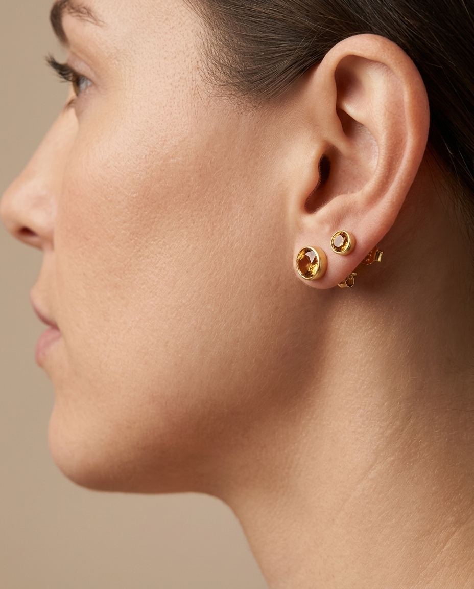14KT Yellow Gold Orange Sapphire Earring Studs on model