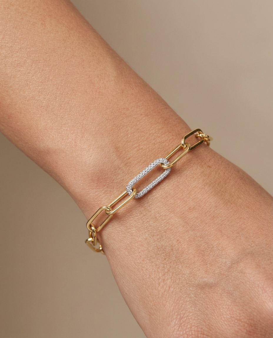 14KT Gold Paperclip Chain with One Diamond Link Bracelet on model