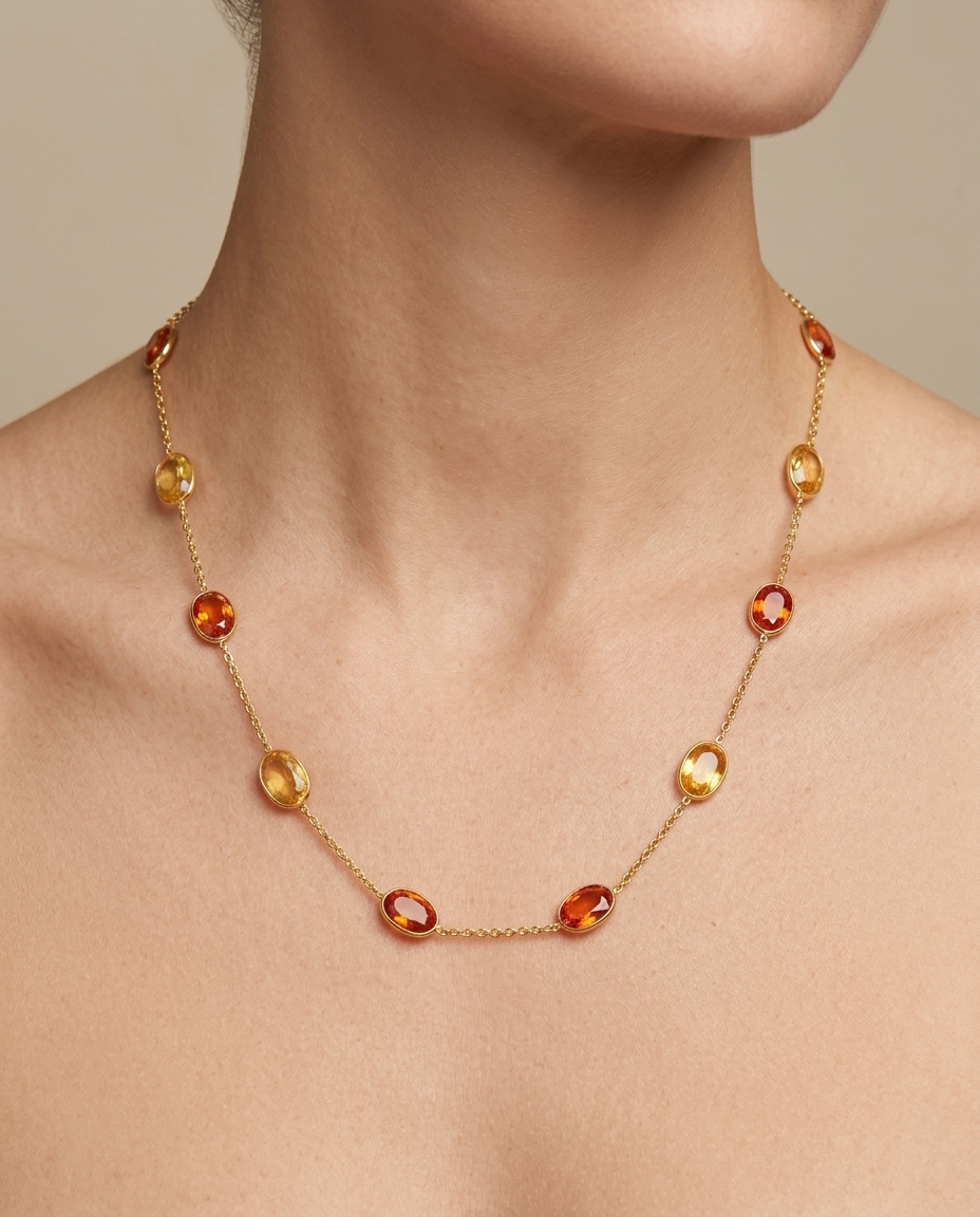 18KT Gold Bazeled Orange and Yellow Sapphire Station Necklace on model
