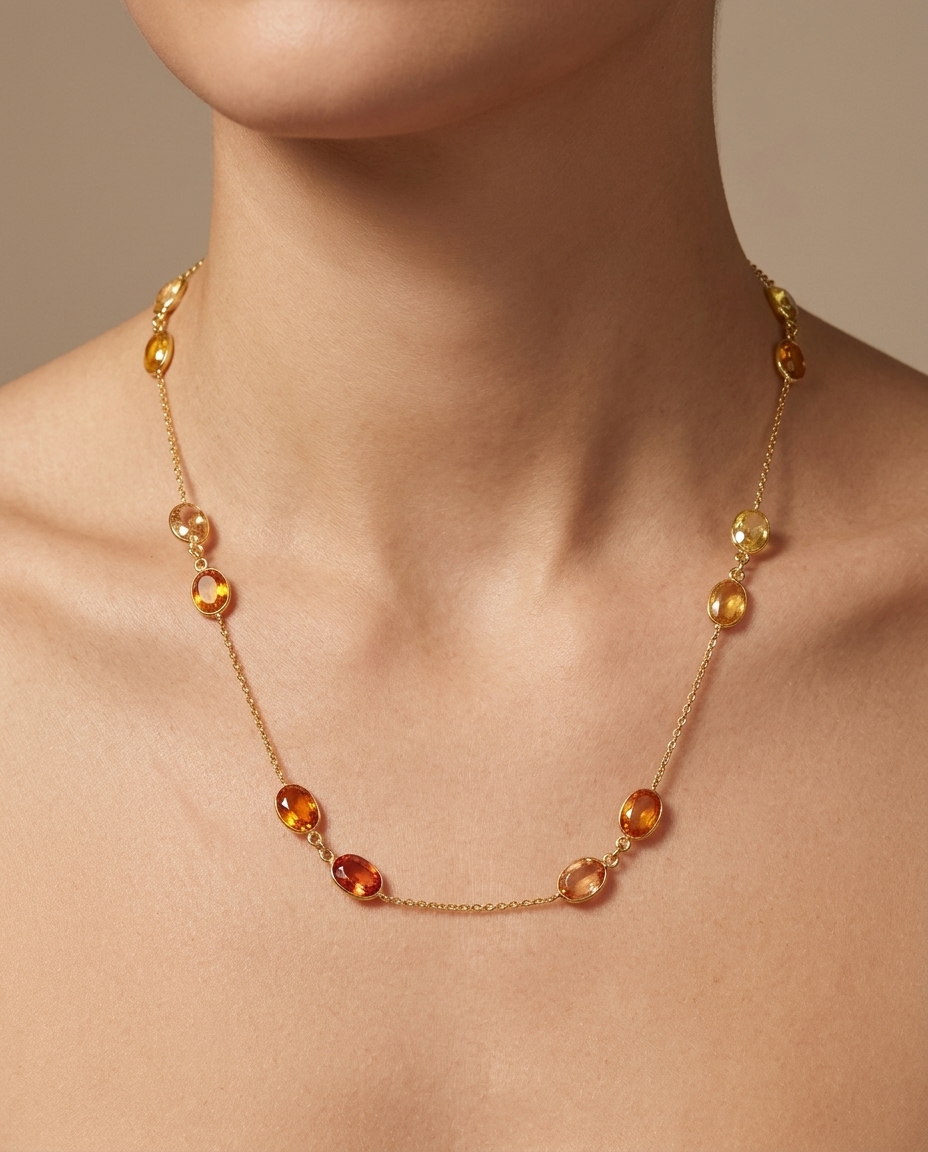 18KT Gold Bazeled Orange and Yellow Sapphire Station Necklace on model