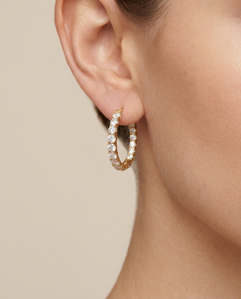 14KT Gold Diamond Huggies Earring on model