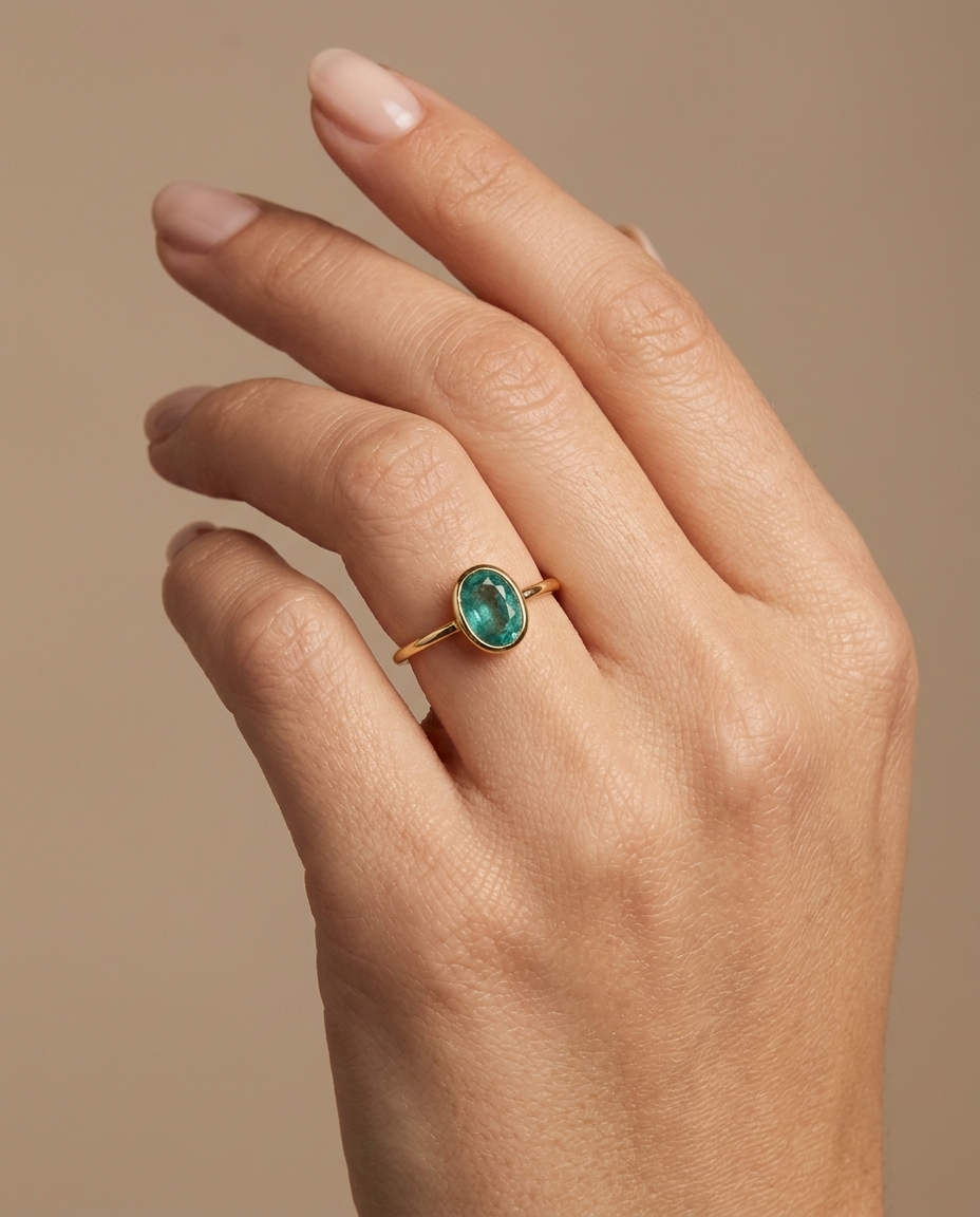 14KT Yellow Gold Emerald Ring on model