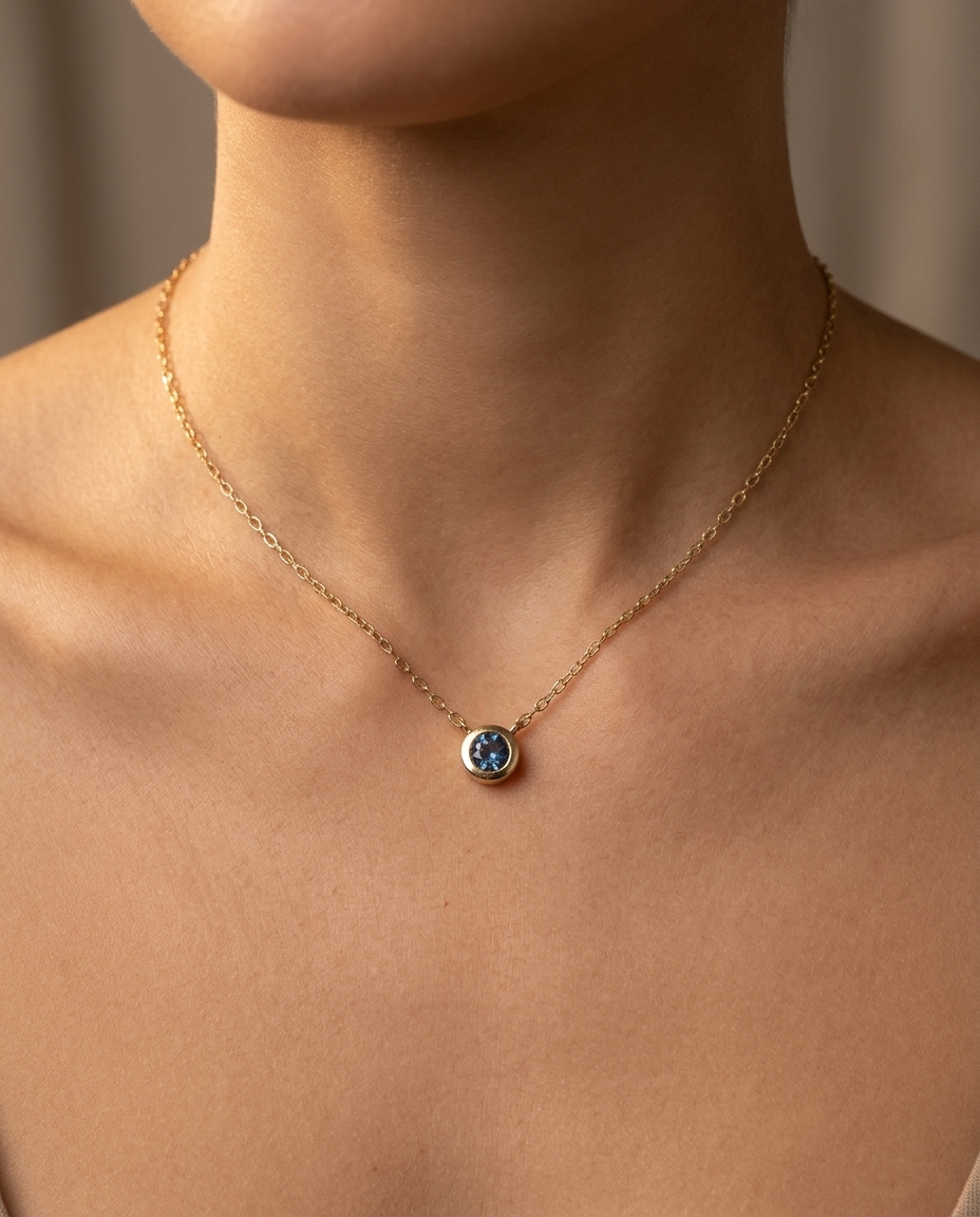 14KT Yellow Gold Blue Topaz Necklace on model