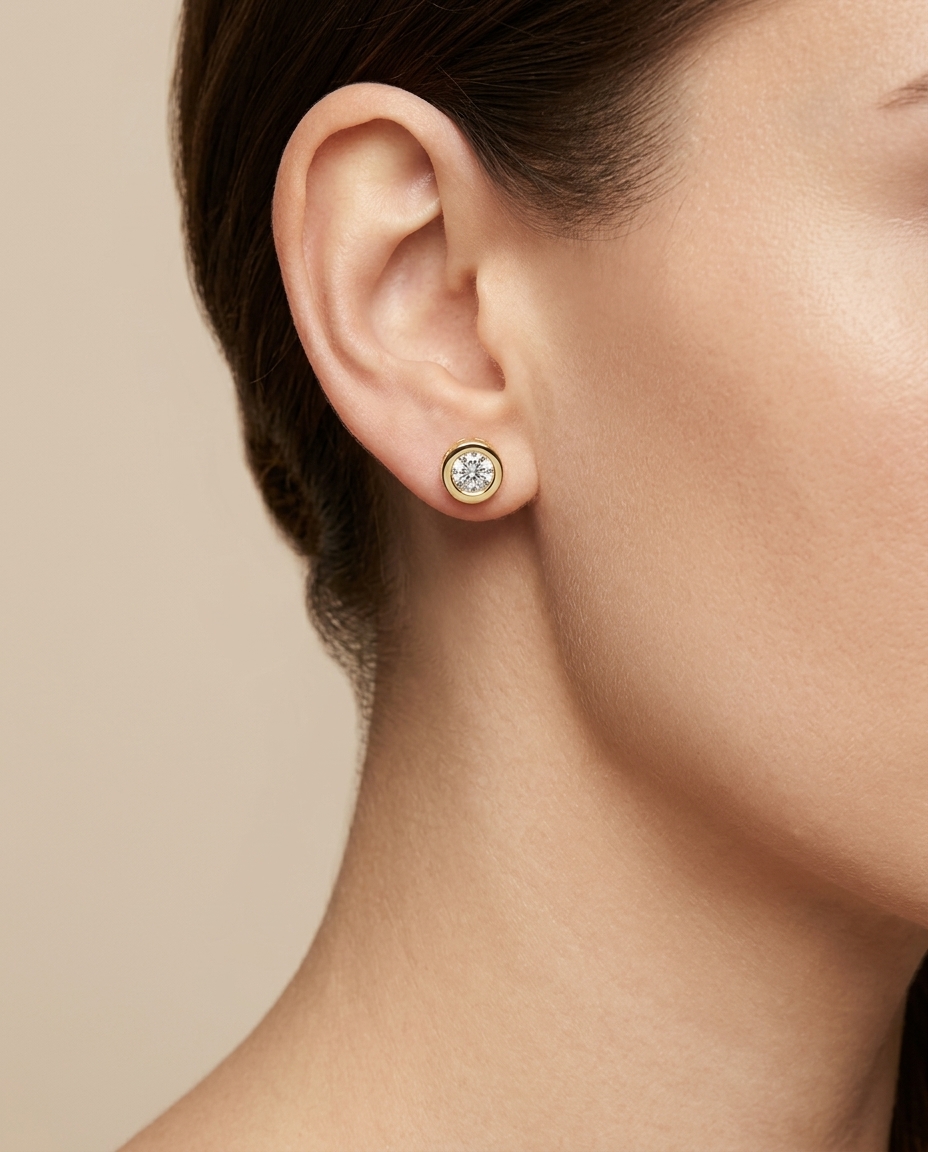 14KT Yellow Gold Bezel Set Diamond Stud Earring on model