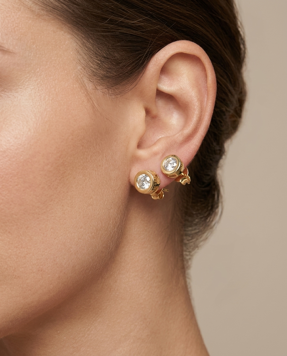 14KT Yellow Gold Bezel Set Diamond Stud Earring on model