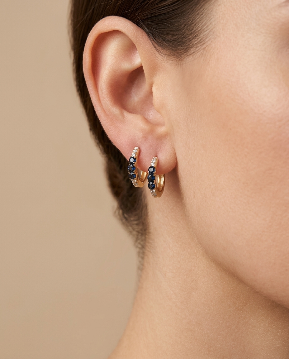 14KT Yellow Gold Diamond and Sapphire Huggies Earring on model