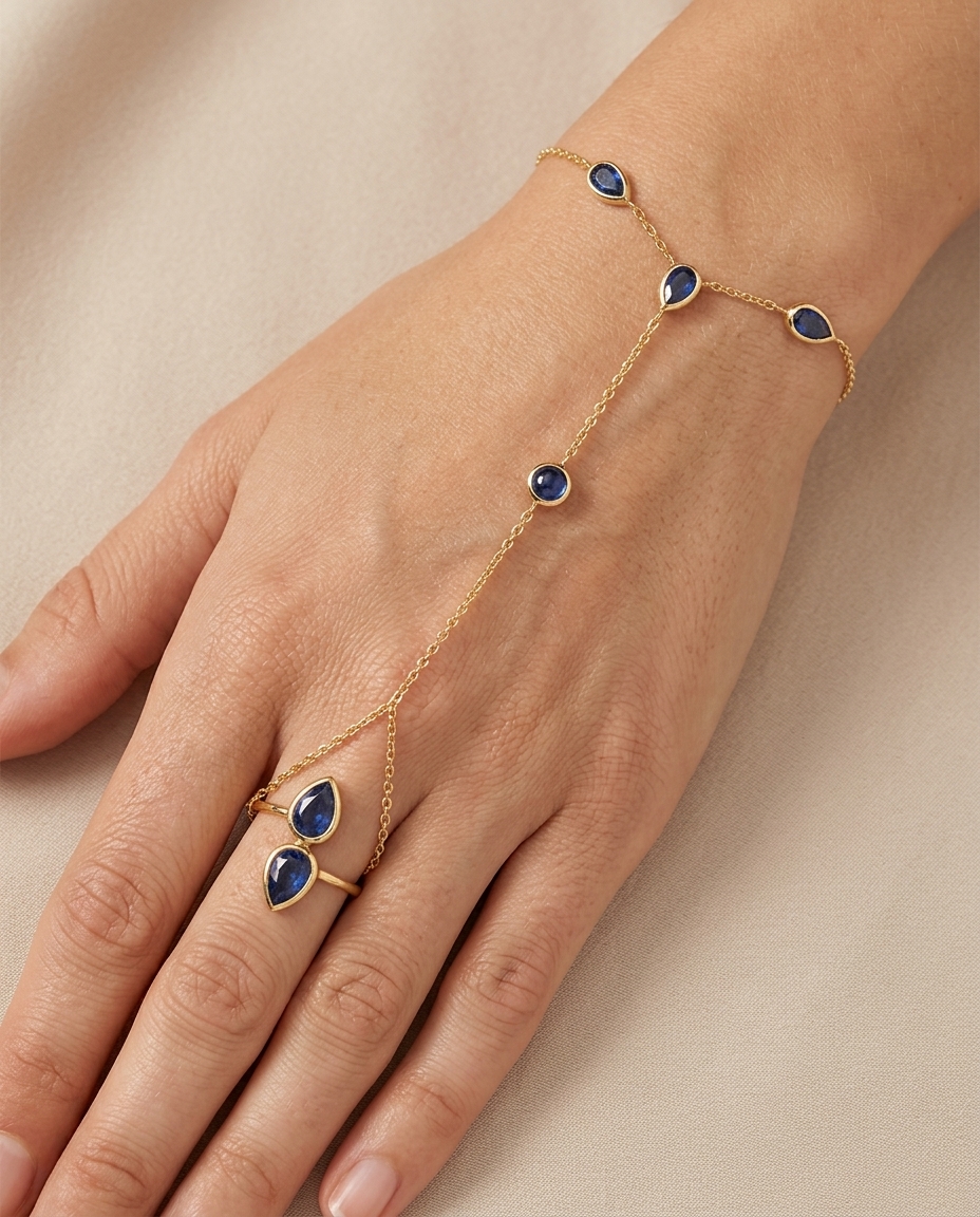 14KT Gold Blue Sapphire Hand Chain on model