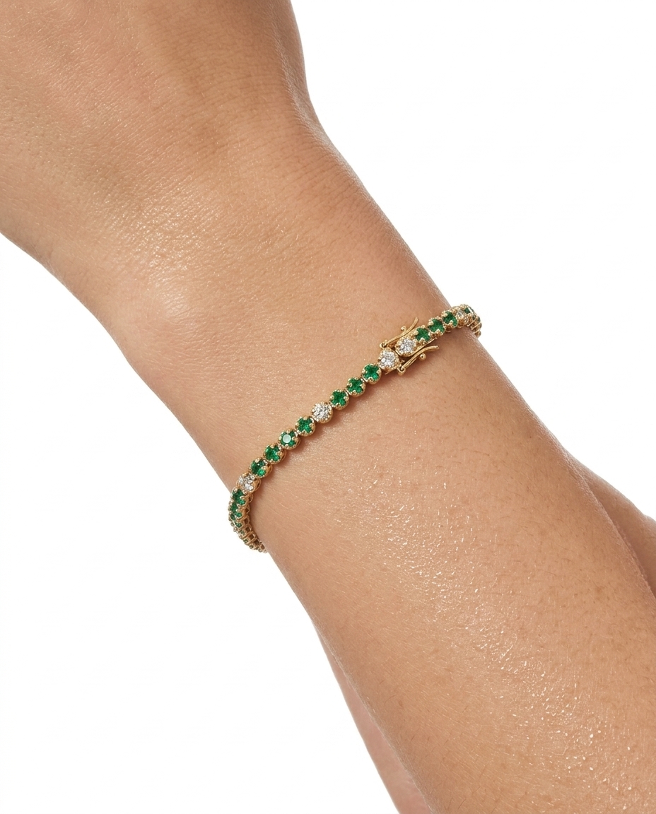 14KT Yellow Gold Diamond and Emerald Tennis Bracelet on model