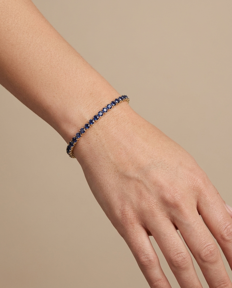 14KT Yellow Gold Blue Sapphire Bracelet on model