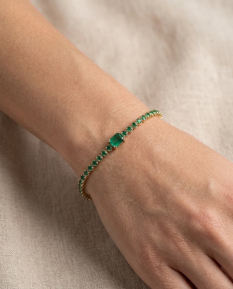 14KT Yellow Gold Emerald Tennis Bracelet on model