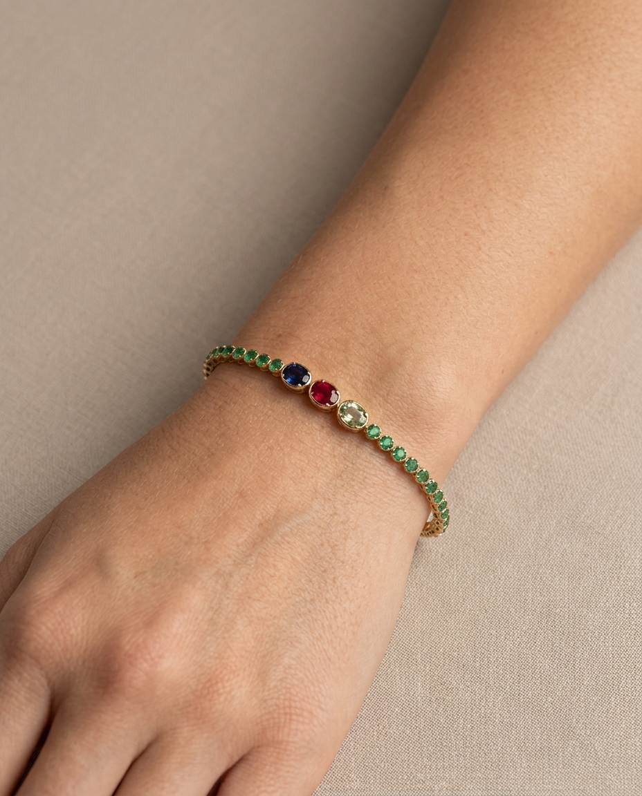 14KT Yellow Gold Emerald and Sapphire Bracelet on model