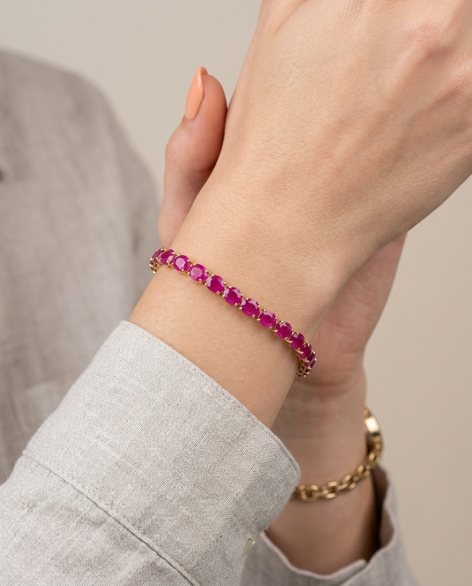 14KT Yellow Gold Ruby Oval Bracelet on model