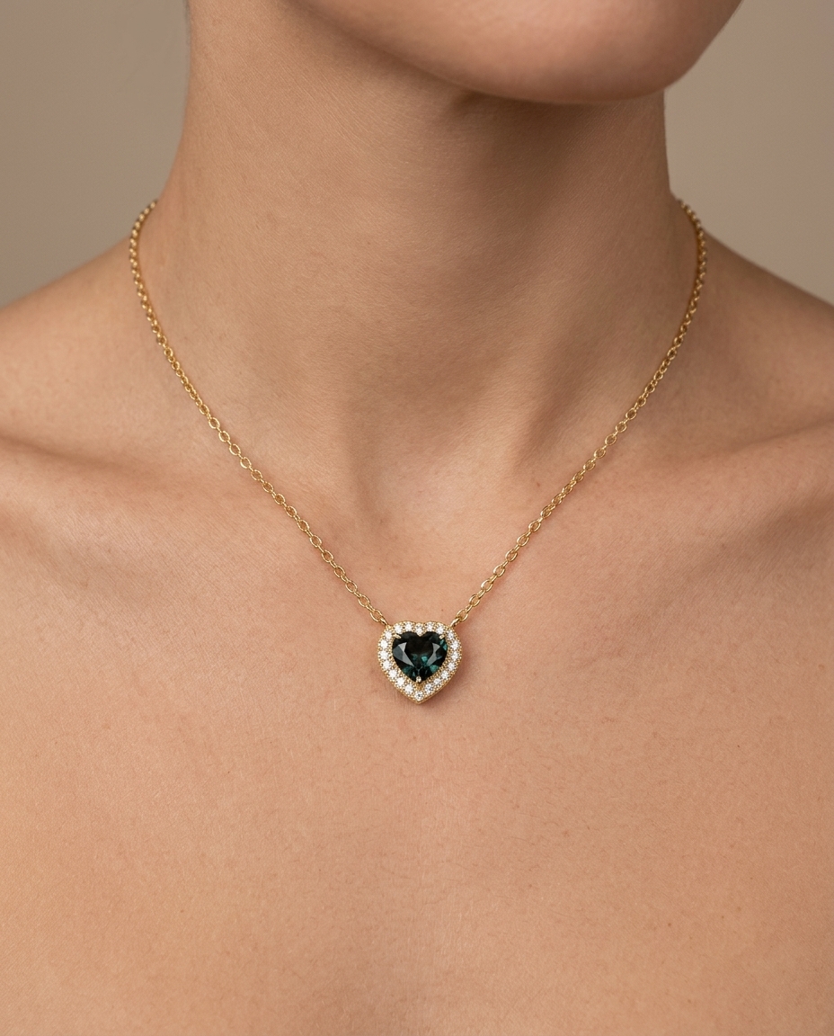 14KT Yellow Gold Diamond and Green Sapphire Heart Necklace on model