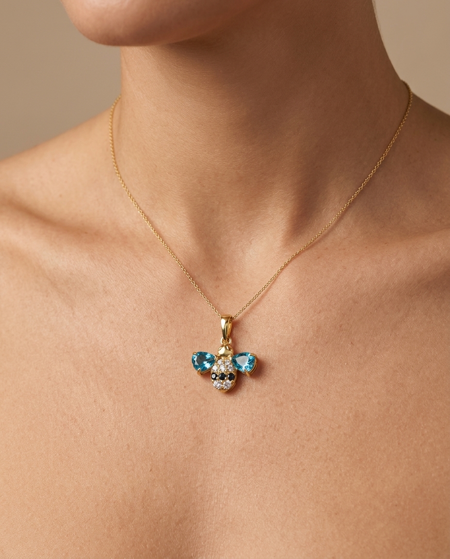 14KT Yellow Gold Blue Sapphire and Diamonds Bee Pendant on model