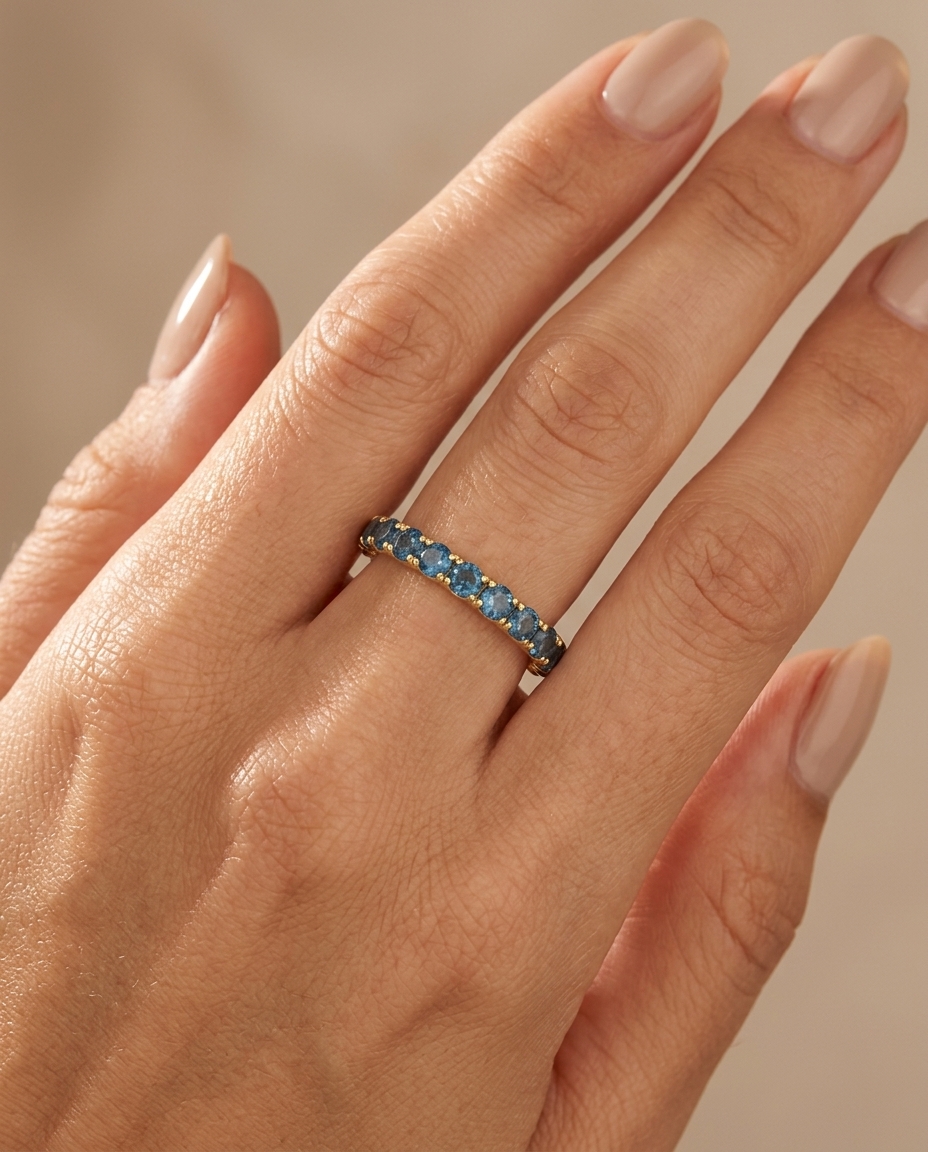 14KT Yellow Gold Blue Topaz Ring on model