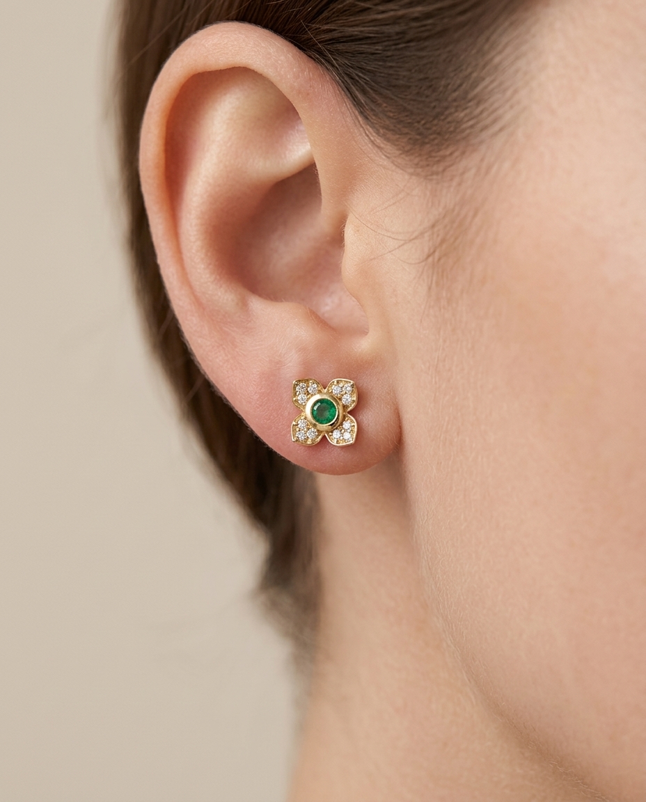 14KT Gold Emerald Flower Earring on model