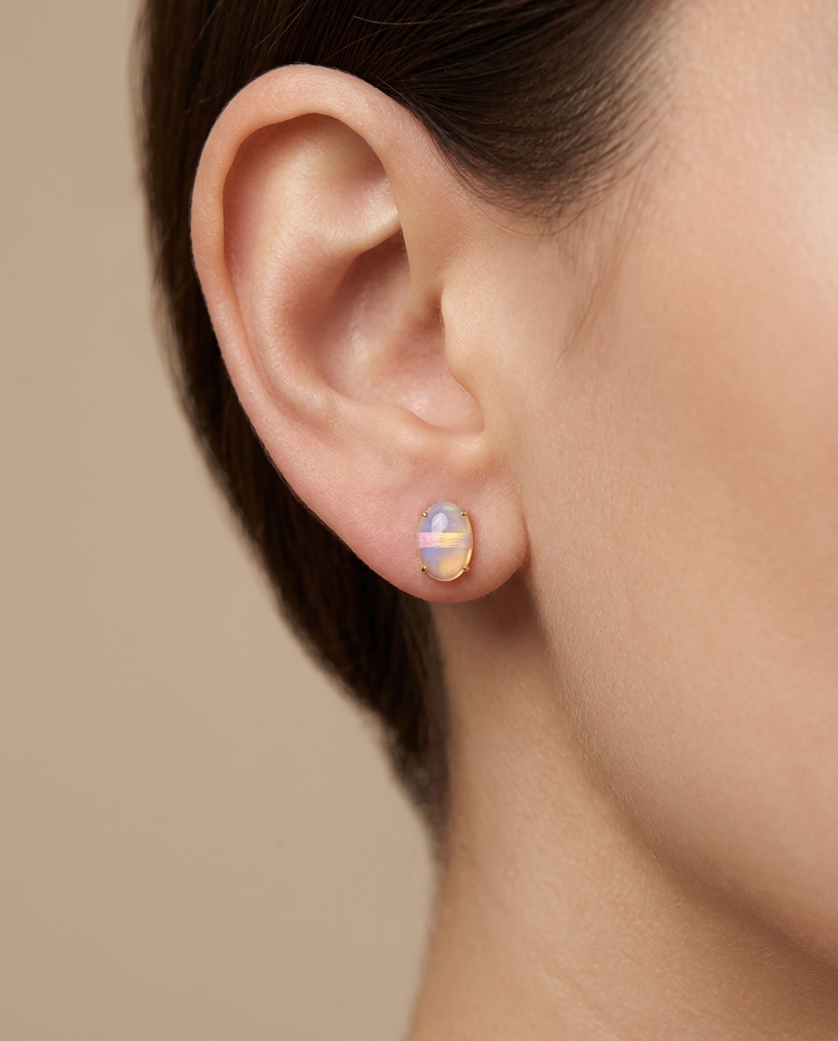 14KT Yellow Gold Oval Shape Opal Earrings on model