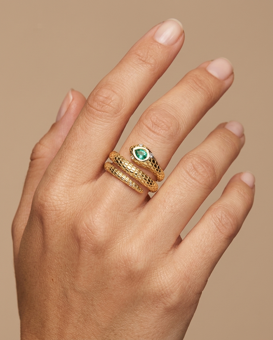 14KT Yellow Gold Snake Ring with Emerald and Diamonds on model