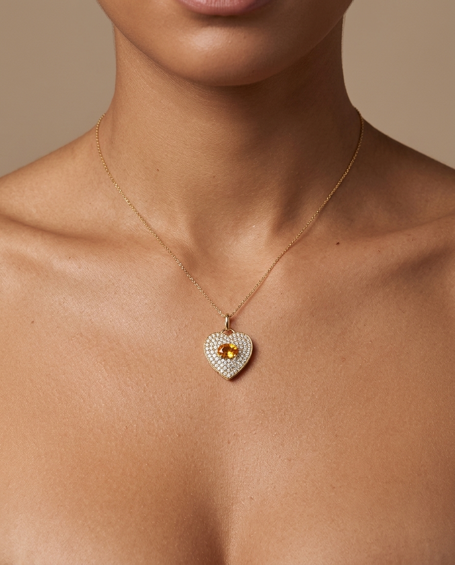 14KT Yellow Gold Heart Pendant with Orange Sapphire and Diamonds on model
