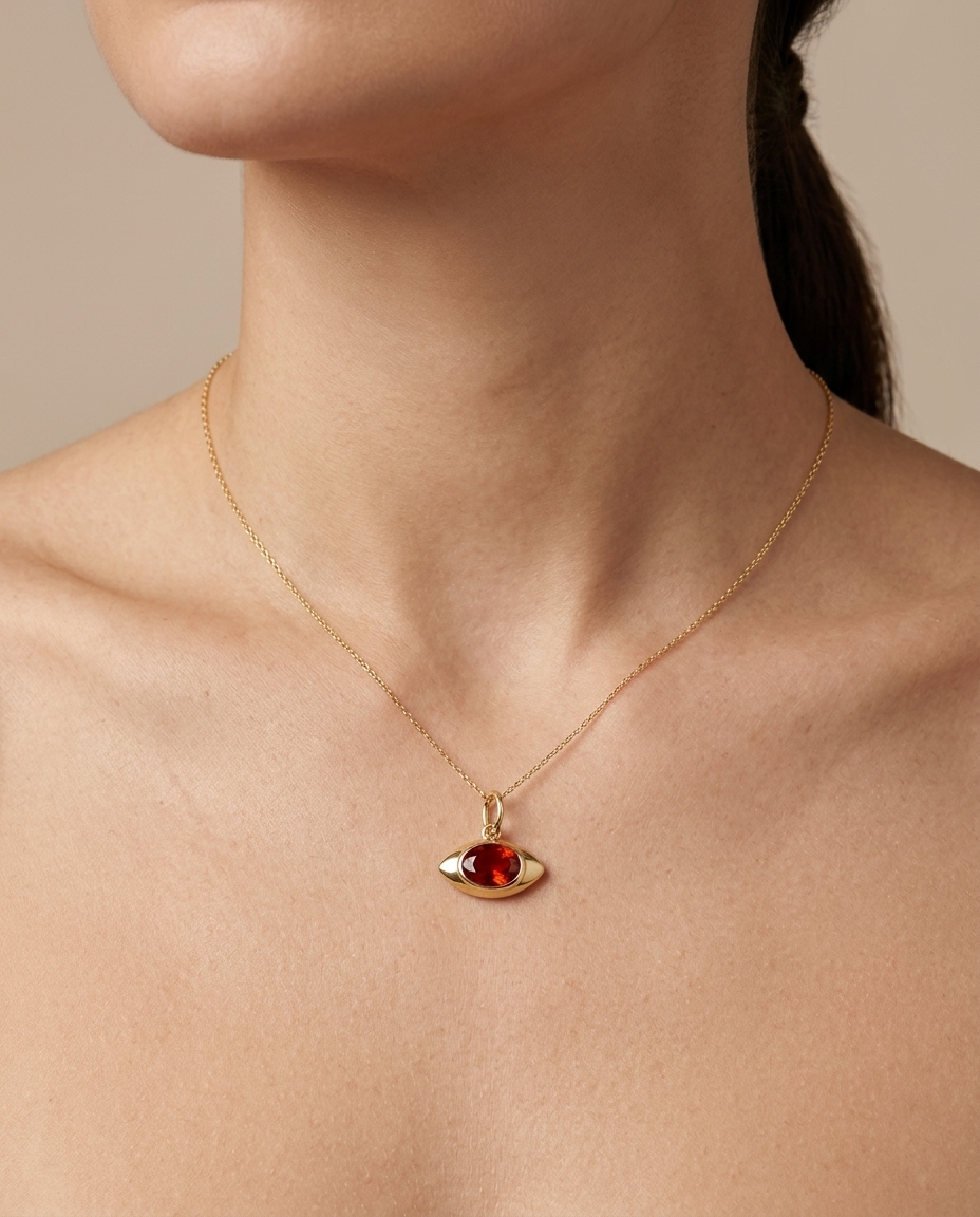 14KT Yellow Gold Orange Sapphire Evil Eye Pendant on model