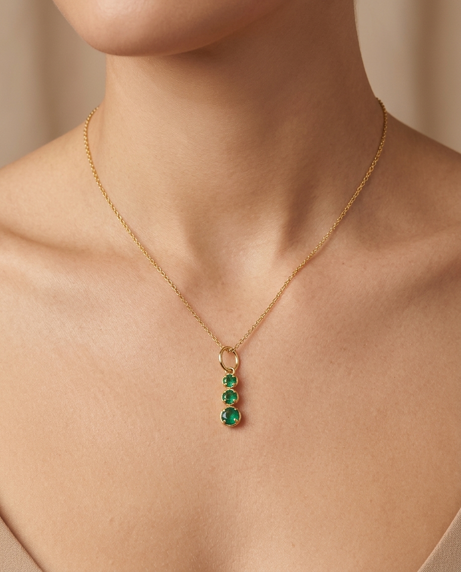 14KT Yellow Gold 3 Emerald Linear Pendant on model