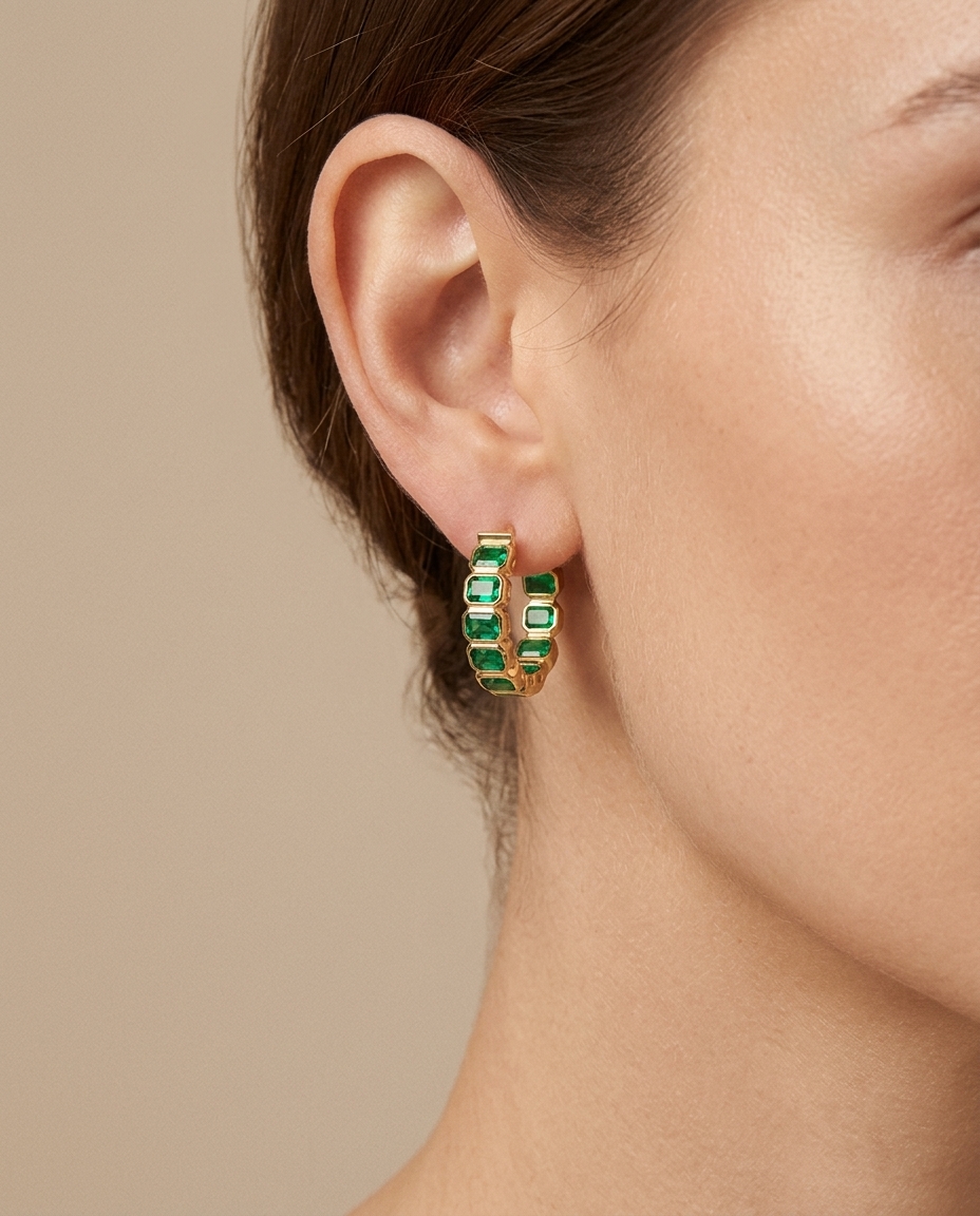 14KT Gold Emerald Hoop Earring (15 MM) on model