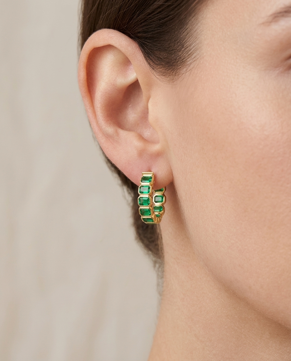 14KT Gold Emerald Hoop Earring (20 MM) on model