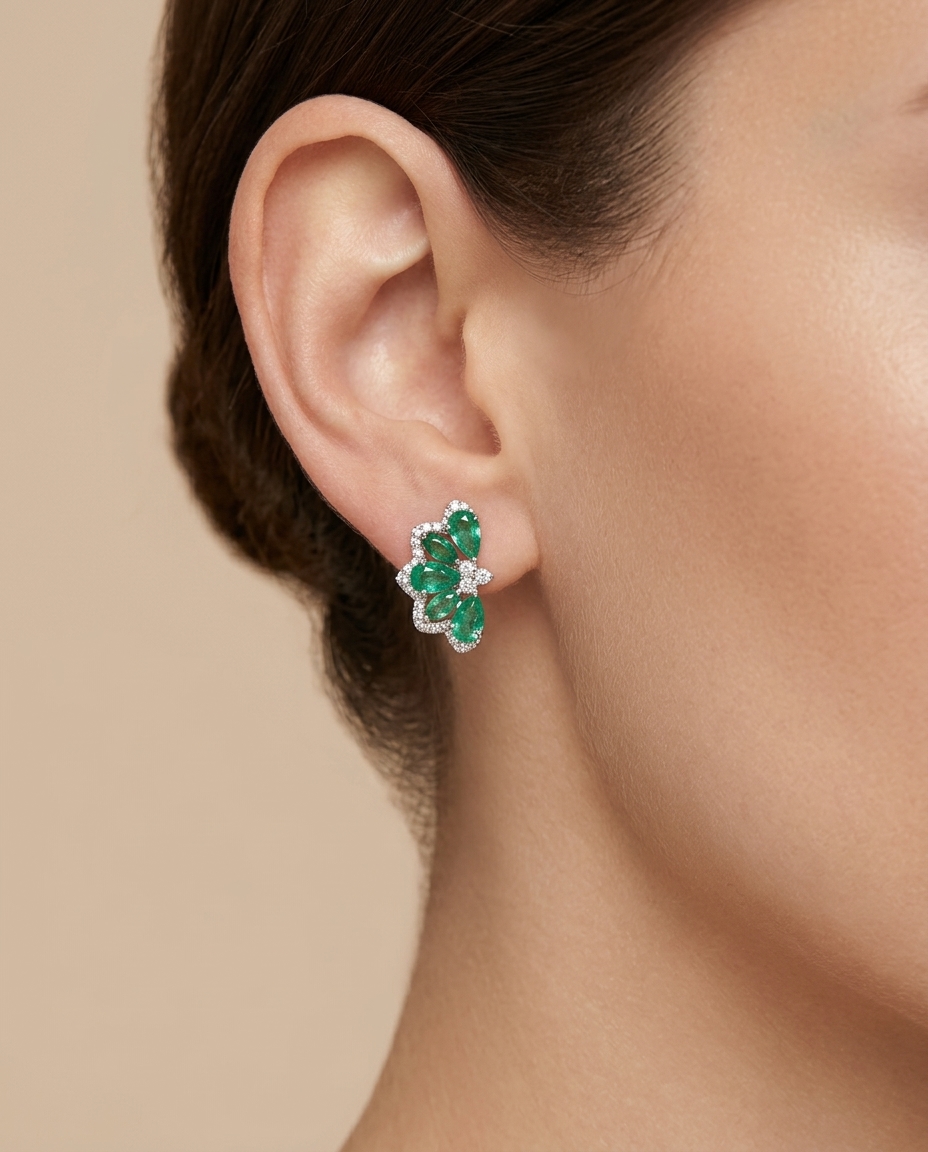 18KT White Gold Emerald and Diamond Earring on model