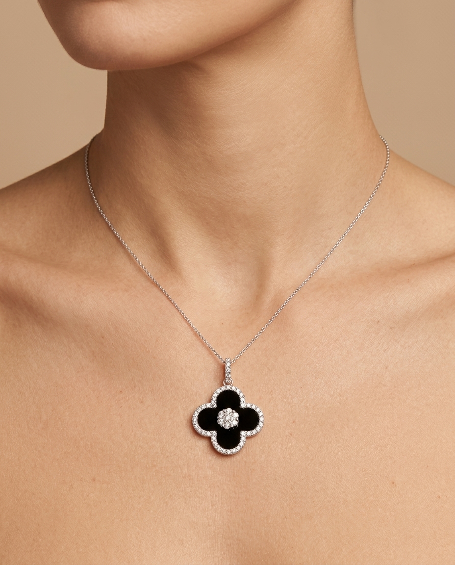 18KT Gold Black Onyx and Diamond Flower Pendant on model