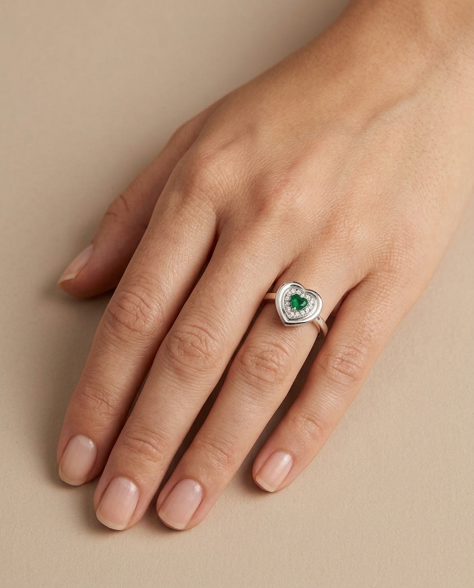 18KT White Gold Emerald and Diamond Ring on model