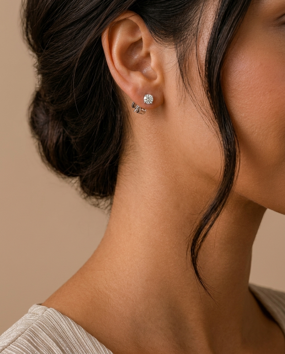 14KT Gold Solitaire Diamond Studs 4 Prong on model