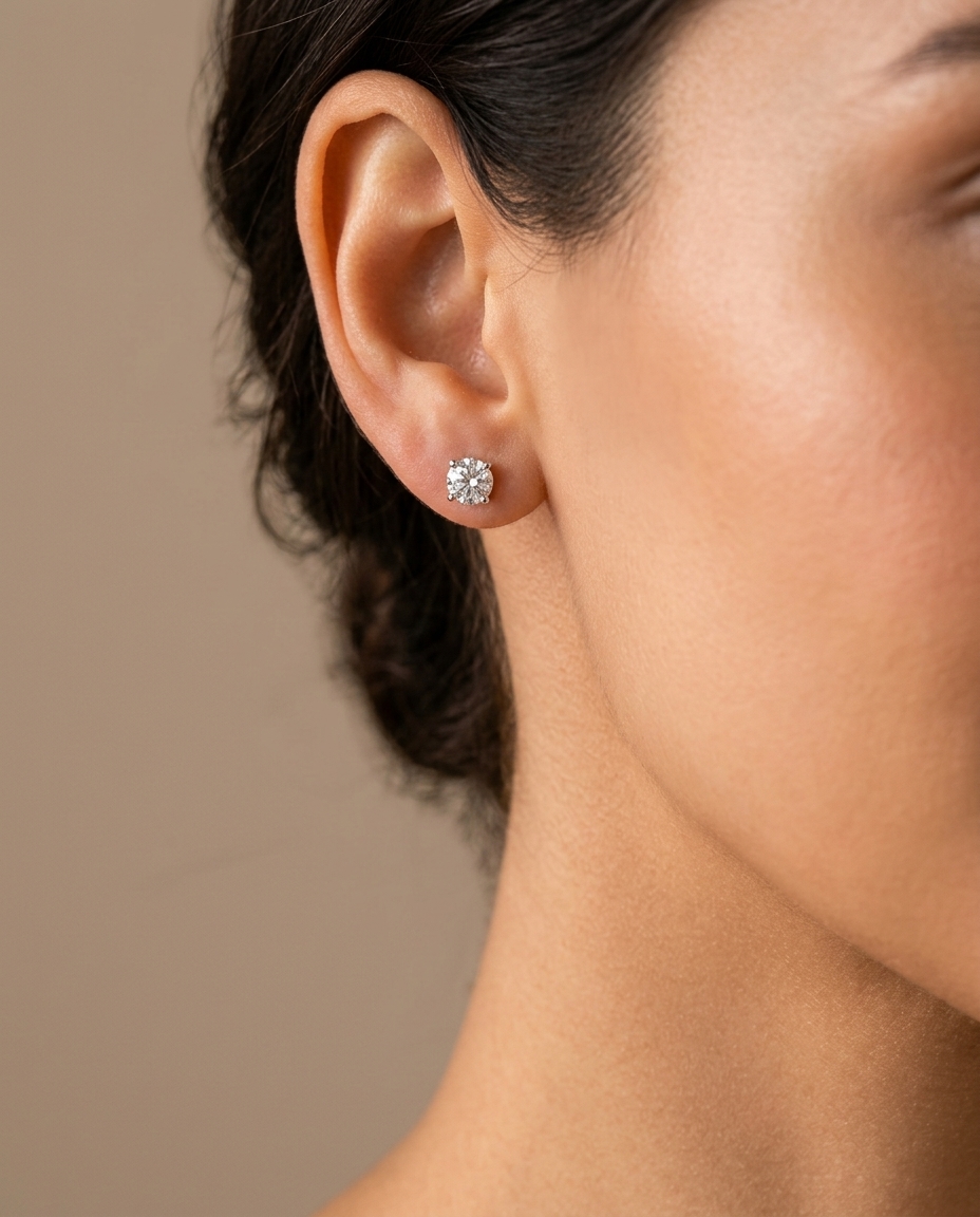14KT Gold Solitaire Diamond Studs 4 Prong on model