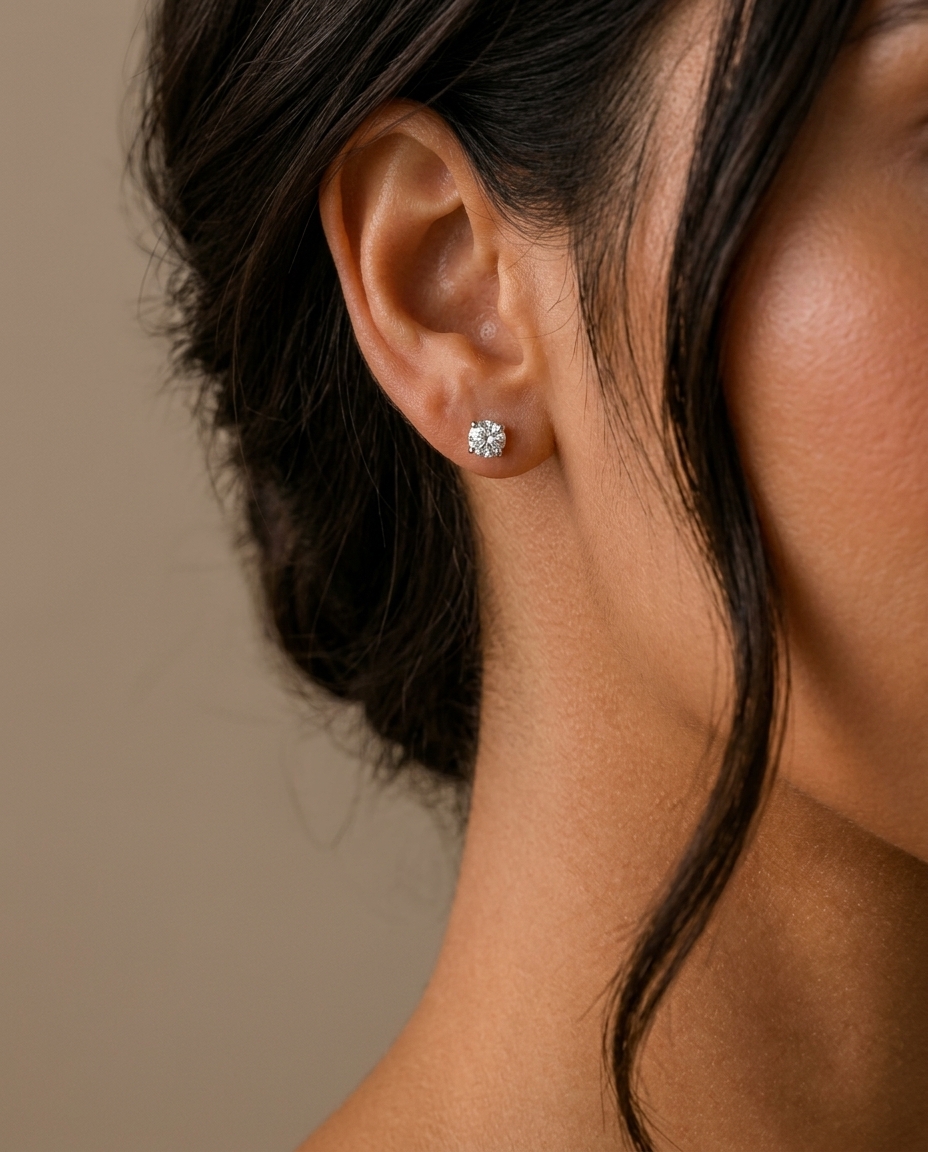 14KT Gold Solitaire Diamond Studs 4 Prong on model