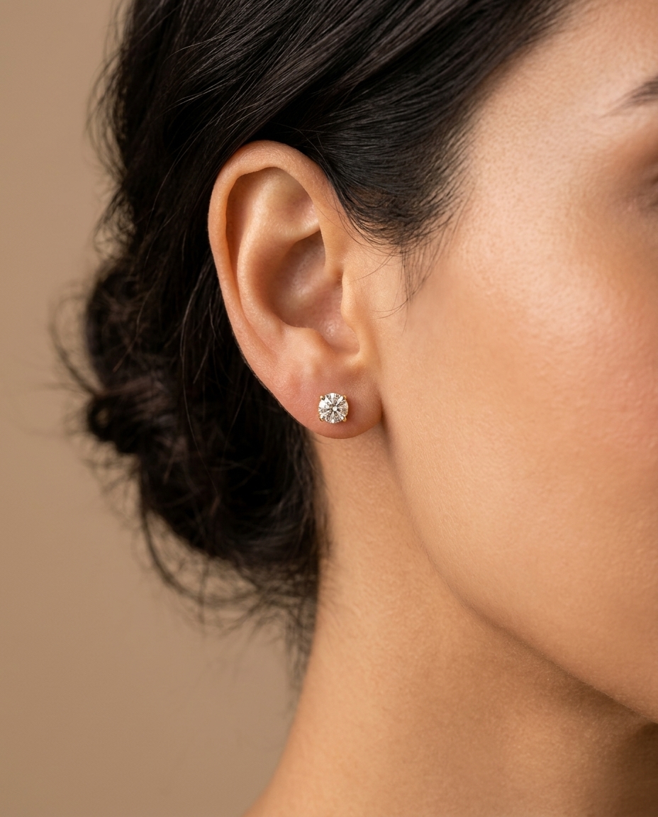 14KT Gold Solitaire Diamond Studs 4 Prong on model