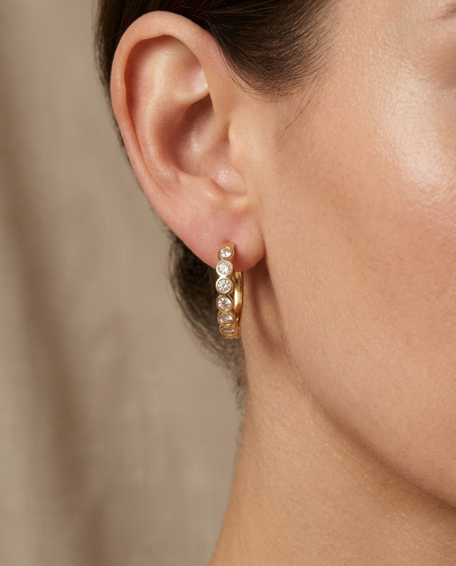 14KT Gold Diamond Huggies Earrings on model