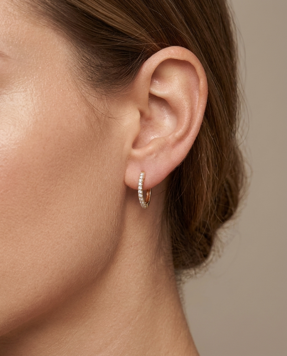 14KT Gold Diamond Huggies Earring on model