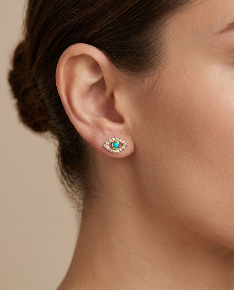 14KT Diamond and Turquoise Evil Eye Studs on model