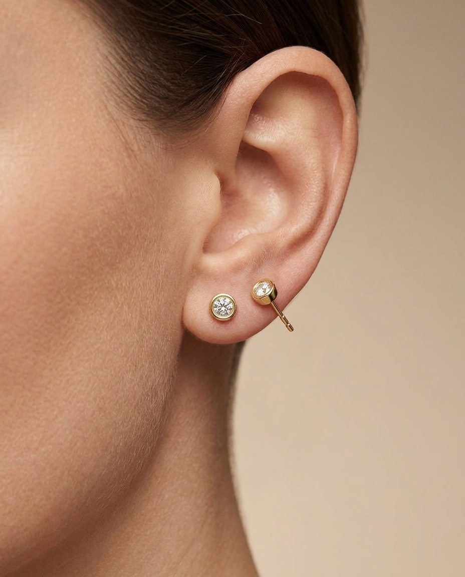 14KT Gold Bezel Set Diamond Earring on model