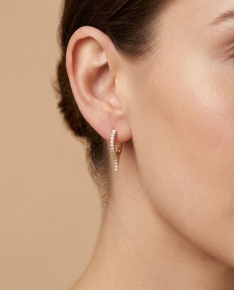 14KT Gold Diamond Spike Huggies on model