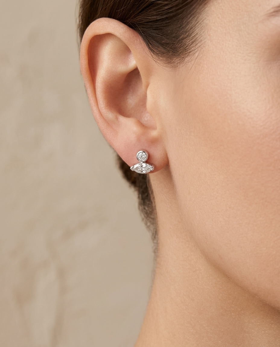 14KT White Gold Bezeled Diamond and Marquise Diamond Earring on model