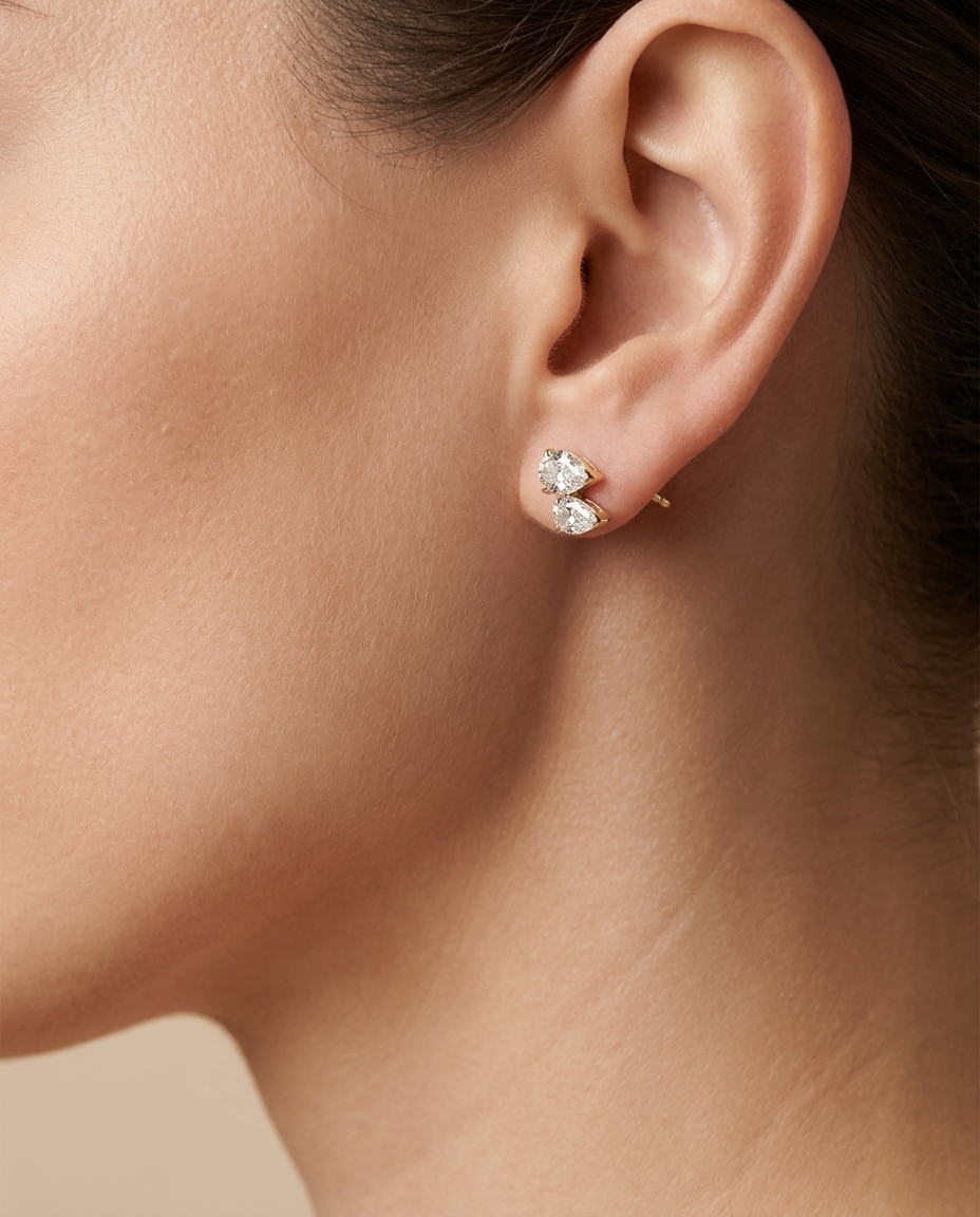 14KT Gold Pear Shape Diamond Earrings on model