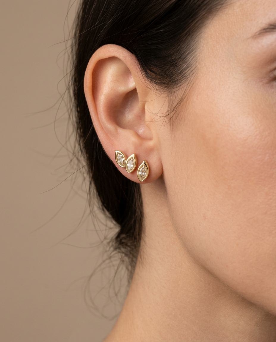 14KT Gold Marquise Diamond Earring on model