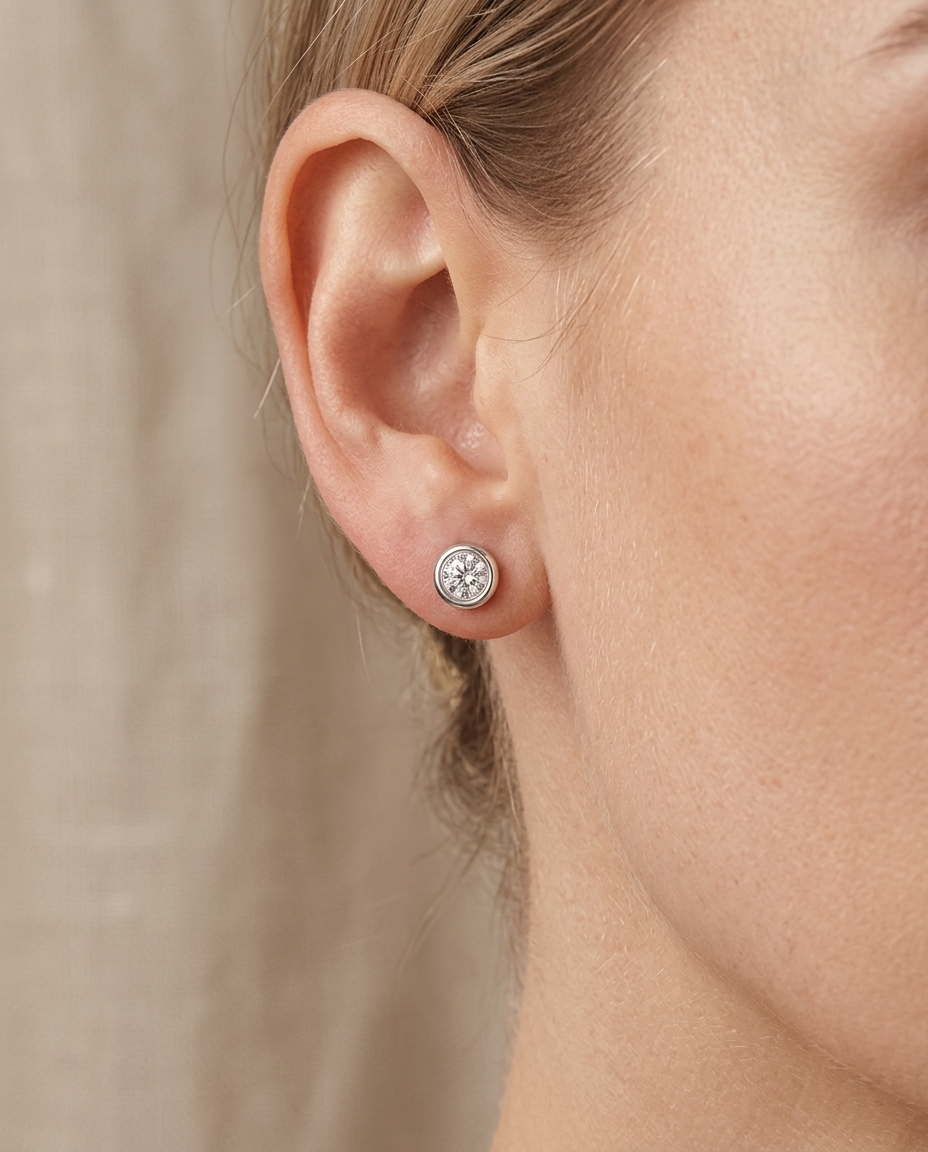 14KT Gold Diamond Bezel Set Earring on model