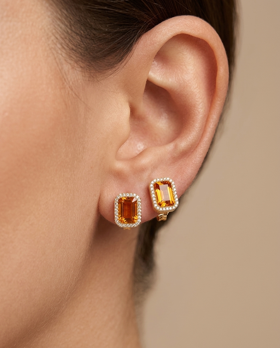 14KT Gold Emerald Cut Orange Sapphire and Diamond Stud Earring on model