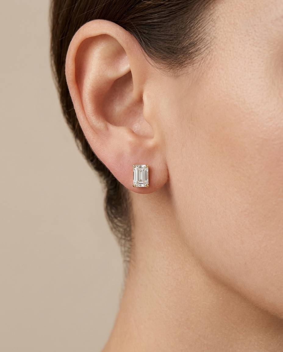 14KT Gold Emerald Cut Diamond Earring Studs on model