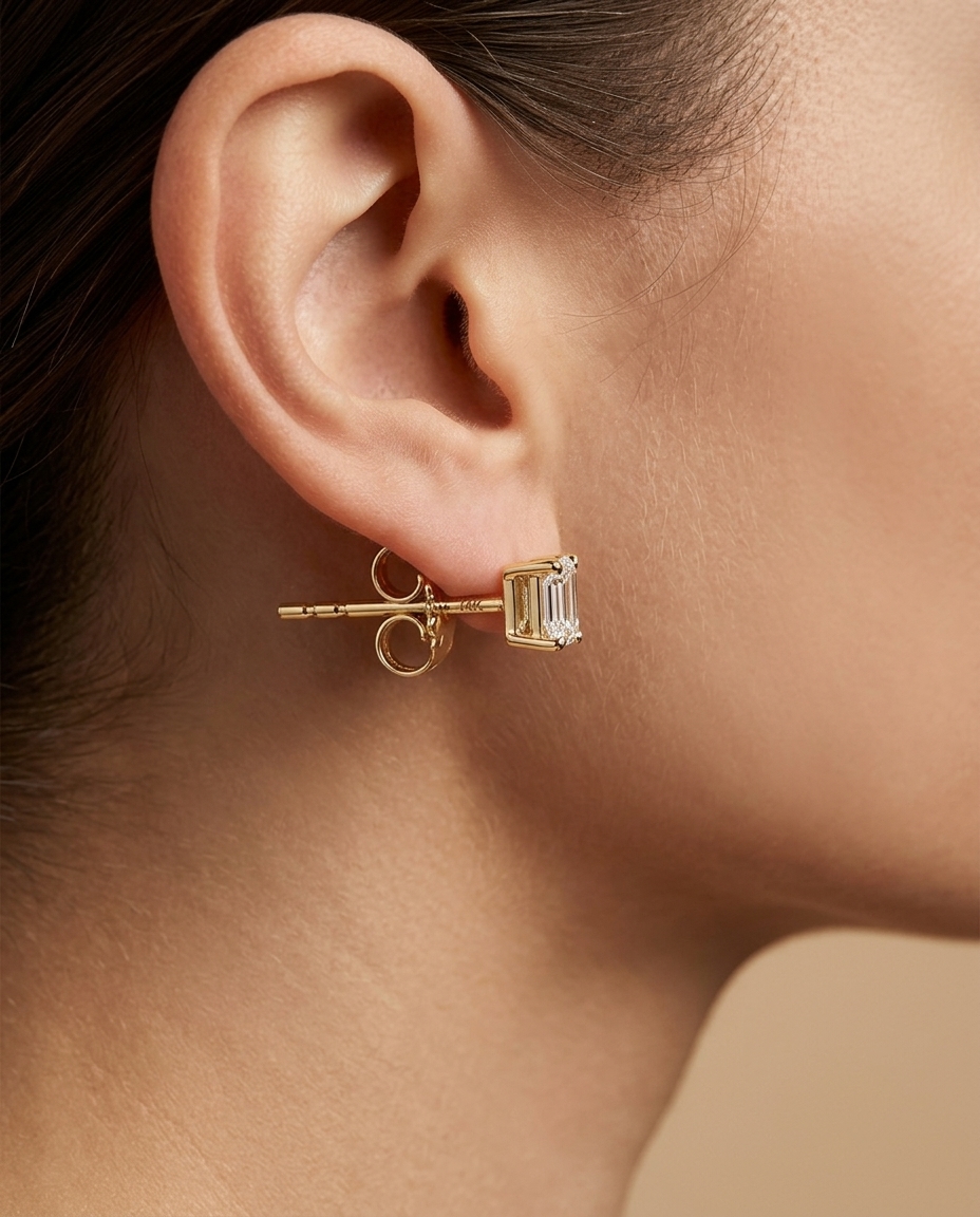 14KT Gold Emerald Cut Diamond Earring Studs on model
