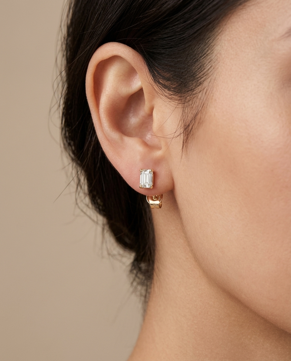 14KT Gold Emerald Cut Diamond Earring Studs on model